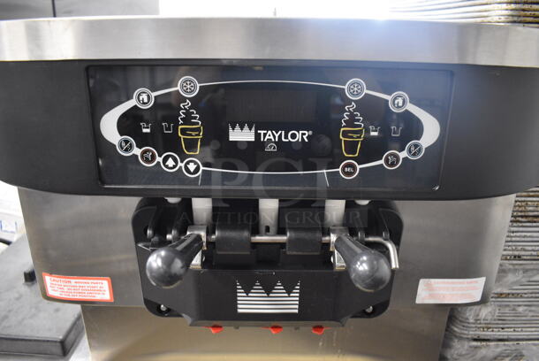 2012 Taylor Model C713-33 Stainless Steel Commercial Floor Style Water Cooled 2 Flavor w/ Twist Soft Serve Ice Cream Machine on Commercial Casters. 208-230 Volts, 3 Phase. 25.5x36x59 - Image 2 of 6