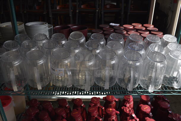 ALL ONE MONEY! Lot of 29 Clear Poly Pitchers! 7x5x8 - Image 2 of 5