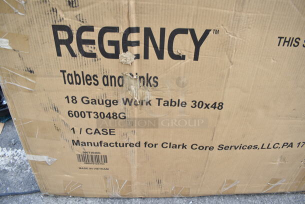 BRAND NEW SCRATCH AND DENT! Regency 600T3048G 30" x 48" 18-Gauge 304 Stainless Steel Commercial Work Table with Galvanized Legs and Undershelf. May Be Missing Pieces.  - Image 2 of 2