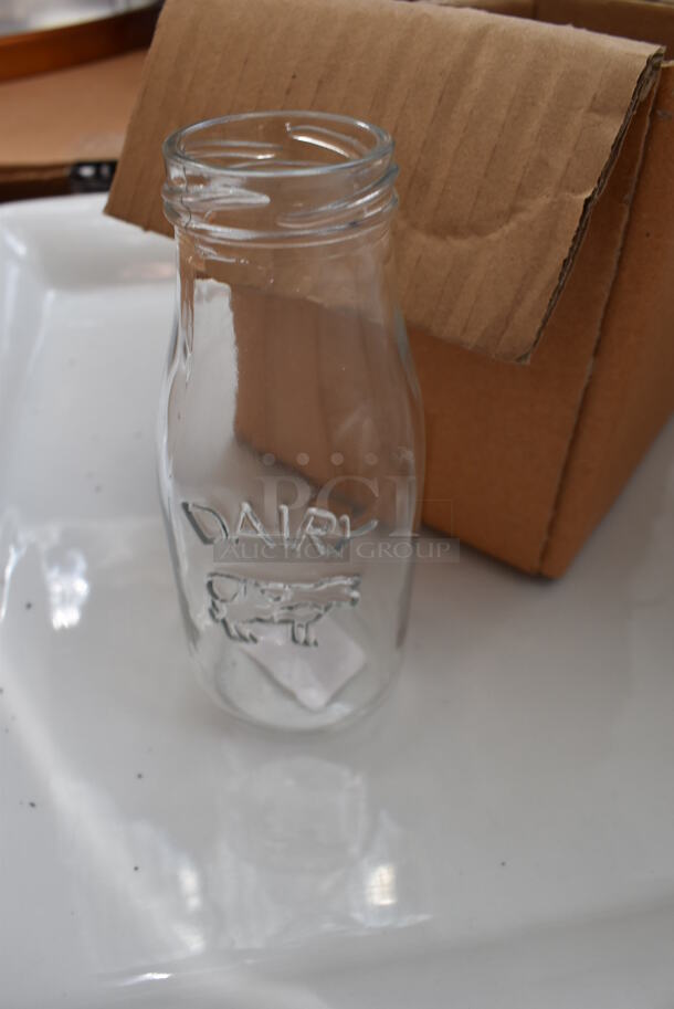 ALL ONE MONEY! Lot of Green Finish 5 Tier Shelving Unit on Commercial Casters w/ Contents Including Glass Bottles, Glass Bowls, Metal Baskets, Ceramic Bowl, Fabric, Decaf Coffee Blend. BUYER MUST DISMANTLE. PCI CANNOT DISMANTLE FOR SHIPPING. PLEASE CONSIDER FREIGHT CHARGES. 36x18x92 - Image 3 of 12