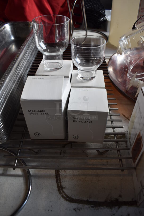 ALL ONE MONEY! Lot of Items on Tabletop Including Metal Bins, Metal Trays, White Poly Trash Can, Tealight Candles, Skillets, Glass Bottles and Glasses - Image 10 of 12