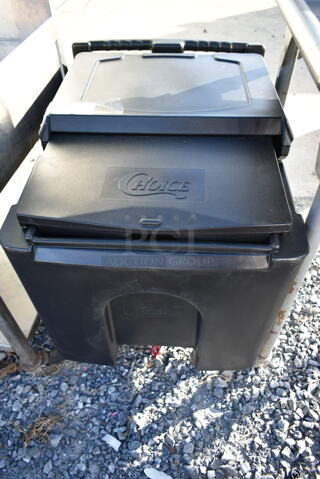 Choice Black Poly Portable Ice Bin on Commercial Casters. 