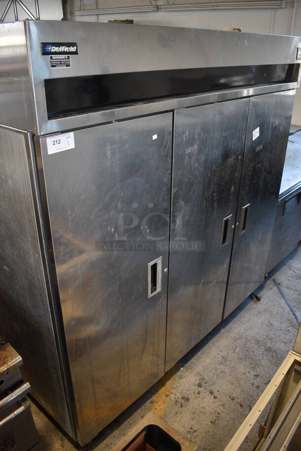 Delfield Stainless Steel Commercial 3 Door Reach In Cooler w/ Poly Coated Racks on Commercial Casters. 77x32x80. Cannot Test Due To Plug Style - Image 1 of 6