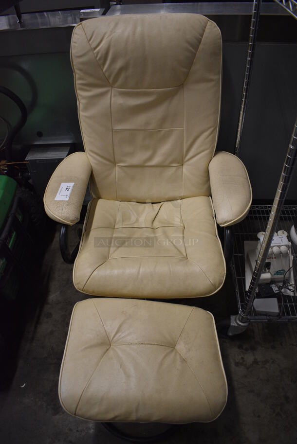 Tan Chair w/ Arm Rests and Foot Rest. 30x28x42. 19x14x14