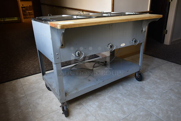 Stainless Steel Commercial 3 Well Steam Table w/ Butcher Block Cutting Board and Under Shelf on Commercial Casters. Tested and Does Not Power On. (front hallway) - Image 3 of 7