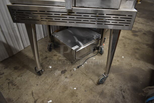 Imperial ICVG-1 Stainless Steel Commercial Natural Gas Powered Full Size Convection Oven w/ View Through Door, Solid Door, Metal Oven Racks, Thermostatic Controls and Metal Legs on Commercial Casters. - Image 3 of 12