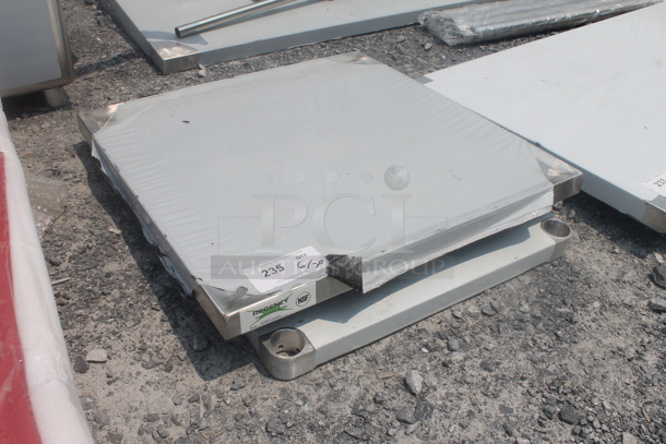 BRAND NEW SCRATCH AND DENT! Regency 600MT2424G Commercial Stainless Steel Mixer Table with Galvanized Legs and Undershelf - Image 2 of 5