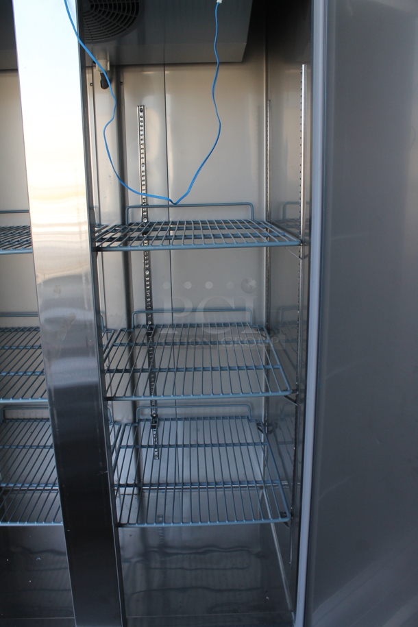 BRAND NEW SCRATCH AND DENT! 2022 KoolMore RIR-2D-SS35C Stainless Steel Commercial 2 Door Reach In Cooler w/ Poly Coated Racks on Commercial Casters. 115 Volts, 1 Phase. Tested and Working! - Image 7 of 9