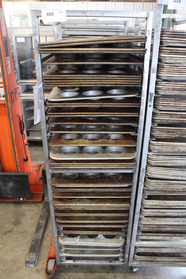 Metal Commercial Pan Transport Rack w/ 46 Metal 12 Cup Muffin Baking Pans on Commercial Casters. 20.5x26x68.5. Pans 18x26x1.5