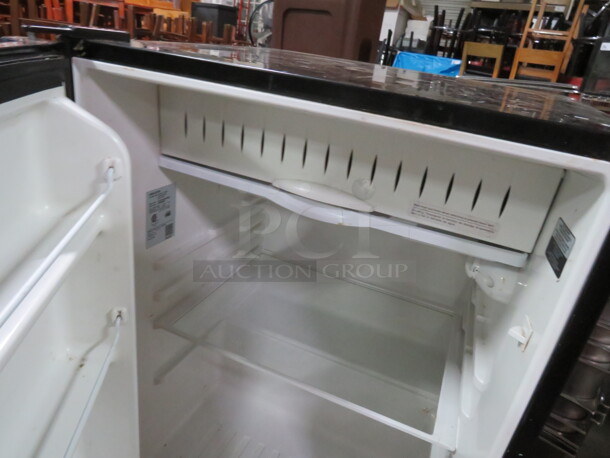 One GE Counter Top Refrigerator. 120 Volt. Model# GCE06GSHSB. 23.5X23.5X33 - Image 2 of 2
