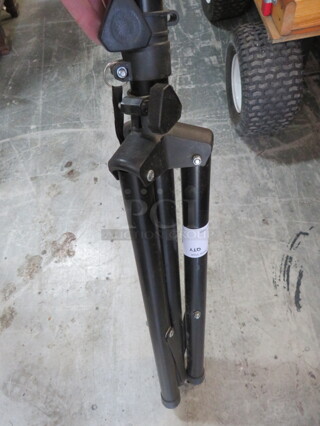 One Tripod Stand.