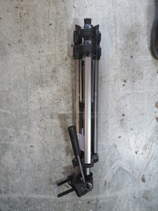 One Tripod Stand.