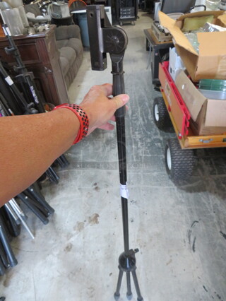 One Tripod Stand.