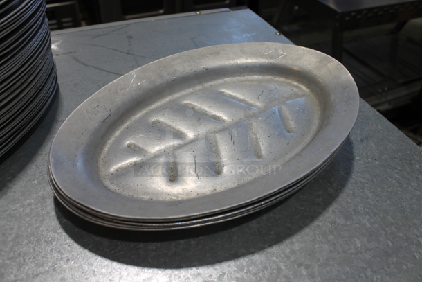 37 Metal Oval Plates; 32 Small and 5 Large. 7x10.5x0.5, 8.5x12.5x1. 37 Times Your Bid! - Image 2 of 3