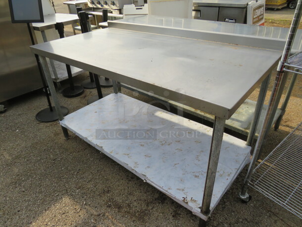 One Stainless Steel Table With Under Shelf. 60X30X37
