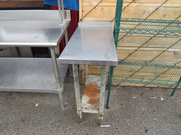 One Stainless Steel Table With Under Shelf. 15X30X36