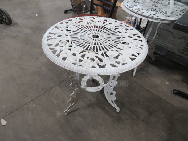 One Wrought Iron Table Painted White With Umbrella Hole. 24X24X27