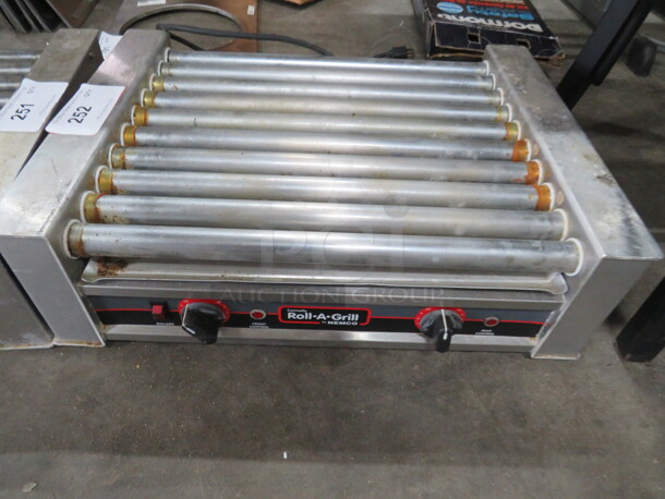 One Nemco Roll A Grill. 120 Volt. Model# 8027. 950 Watt. 22X16X6.5