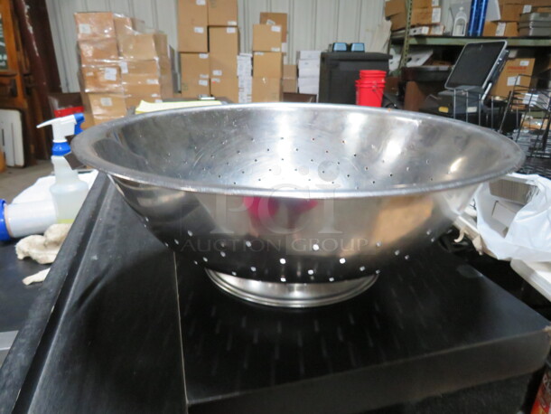 One 13 Inch Collander.