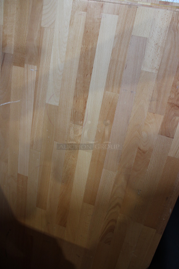 Wooden Butcher Block Tabletop and 2 Black Metal Straight Table Bases. Table Is Disassembled. 48x30x30. Tabletop 48x30x2, Table Bases 22x13x28 - Image 2 of 3