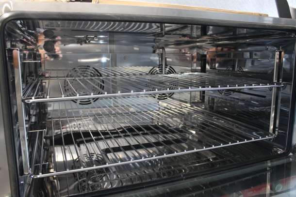BRAND NEW SCRATCH AND DENT! Avantco 177CO46M Stainless Steel Commercial Countertop Full Size Convection Oven w/ View Through Door, Metal Oven Racks, Thermostatic Controls and Steam Injection. 4.4 cu ft. 208/240 Volts, 1 Phase. - Image 5 of 6