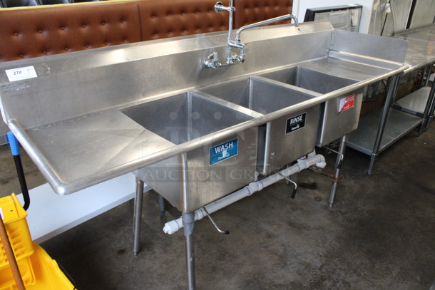 Stainless Steel Commercial 3 Bay Sink w/ Dual Drainboards, Faucet, Handles and Right Side Splash Guard. 88x26x44. Bays 16x20x12. Drainboards 16x22x2