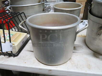 One 12 Quart Aluminum Stock pot.