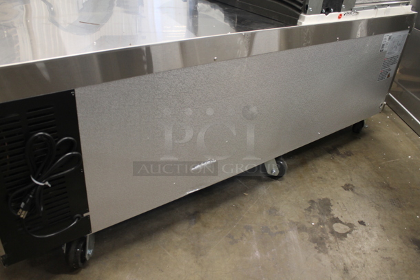 BRAND NEW SCRATCH AND DENT! Avantco 178CBE72HC Commercial Stainless Steel Electric 4-Door Refrigerated Chef Base On Commercial Casters.  115 Volts, 1 Phase. Tested and Working! - Image 11 of 11