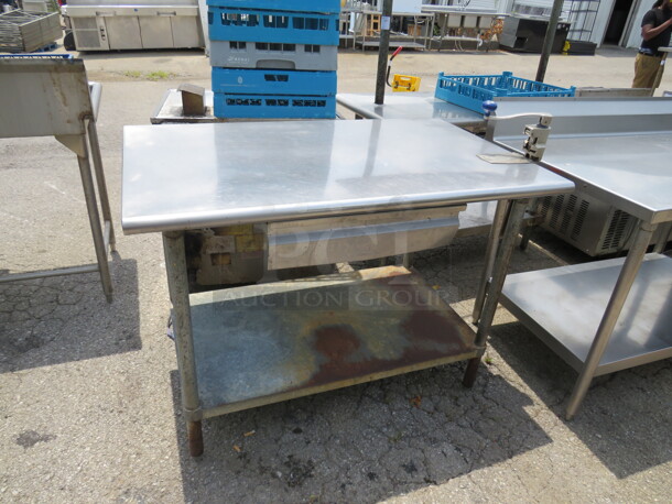 One Advance Tabco Stainless Steel Table With 10lb Can Opener With Under Shelf And 1 Drawer.  48X30X34 - Image 2 of 3
