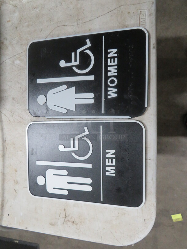 Men/Women Braille Restroom Sign. 2XBID - Image 1 of 1