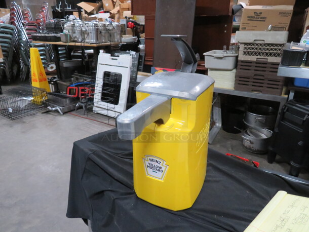 One 1.5 Gallon Asept Mustard Dispenser. 