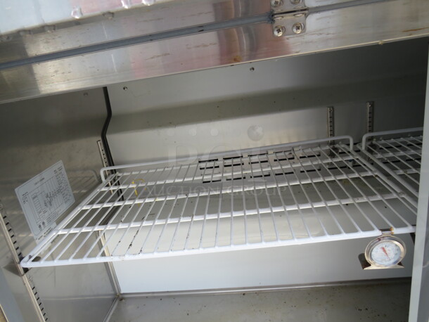 One Stainless Steel 2 Door Polar Refrigerated Prep Table With 2 Racks And Cutting Board,  On Casters. Model# SCLM2-60-E. 115 Volt. 60X34X45.5 - Image 2 of 2