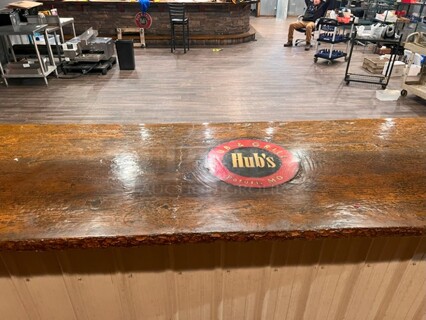 Concrete Bar Style Top with Business Logo in Serving Window. 
 x34.5