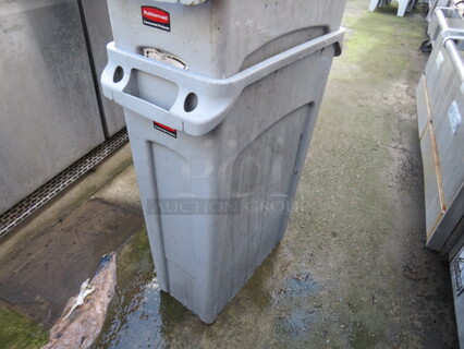 One Rubbermaid Slim Jim Trash Can.