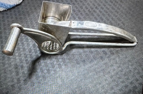 One Stainless Steel Cheese Grater.