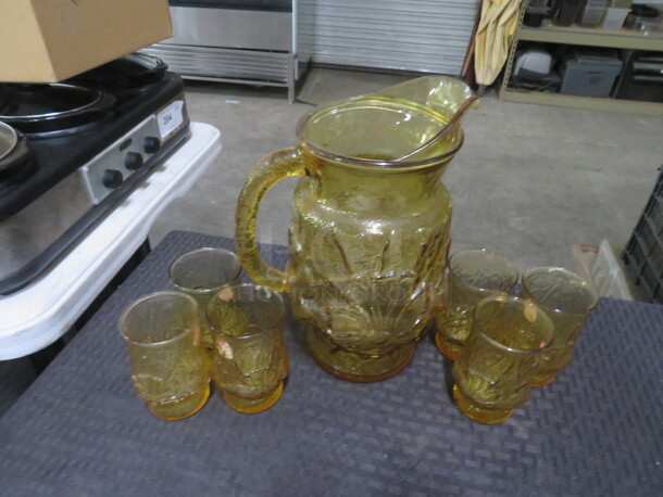 One Vintage Gold Glass Pitcher With 6 Matching Glasses. - Image 1 of 1
