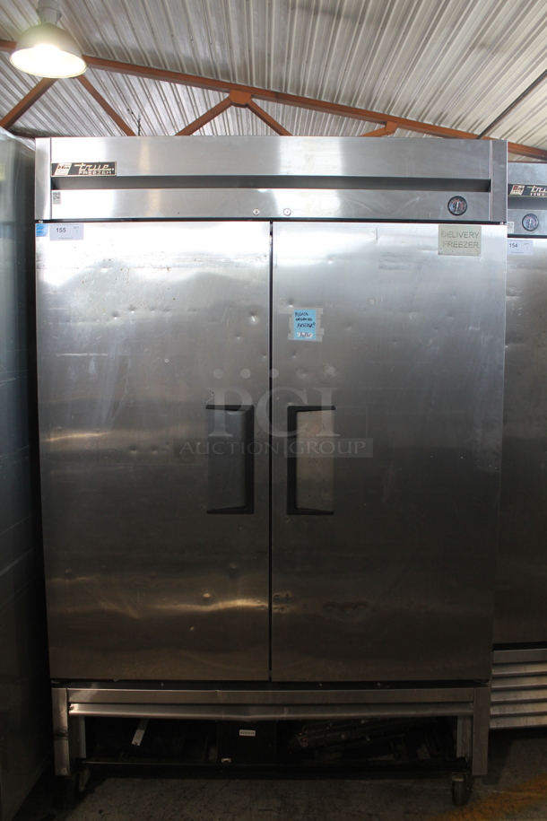 2013 True T-49F ENERGY STAR Stainless Steel Commercial 2 Door Reach In Freezer w/ Poly Coated Racks on Commercial Casters. 115 Volts, 1 Phase. Tested and Working! - Image 1 of 8