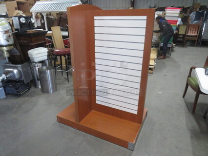 One Tri Sided Beige/Brown Slat Wall Display On Casters. 44.5X29.5X60