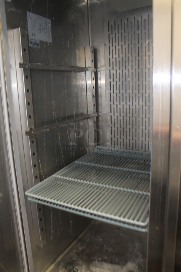 Avantco 178CFD2RR Stainless Steel Commercial 2 Door Reach In Cooler w/ Poly Coated Racks on Commercial Casters. 115 Volts, 1 Phase. Tested and Working! - Image 5 of 6