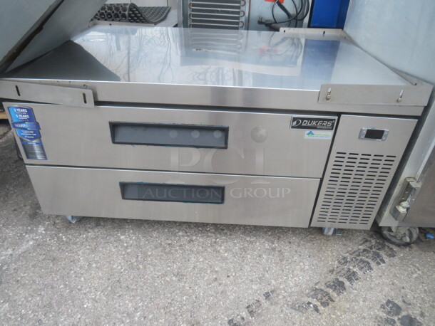 One Stainless Steel 2 Drawer Dukers Refrigerated Chef Base On Casters. Model# DCB48-D2. 115 Volt. 48.5X32X25. - Image 2 of 2