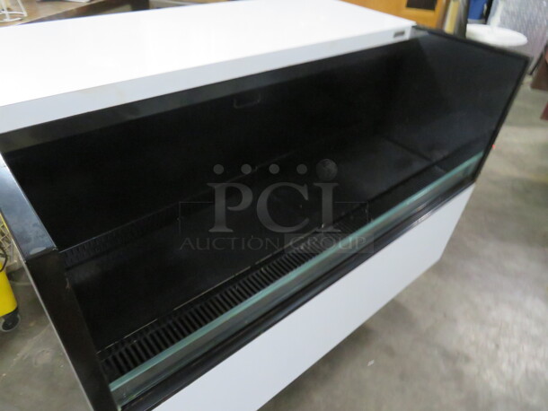 One WORKING Oasis Structural Concepts Under Counter Air Curtain Merchandiser With Manual. 47X32X34. Model# CO43R. 120 Volt. $9341.10. - Image 3 of 7