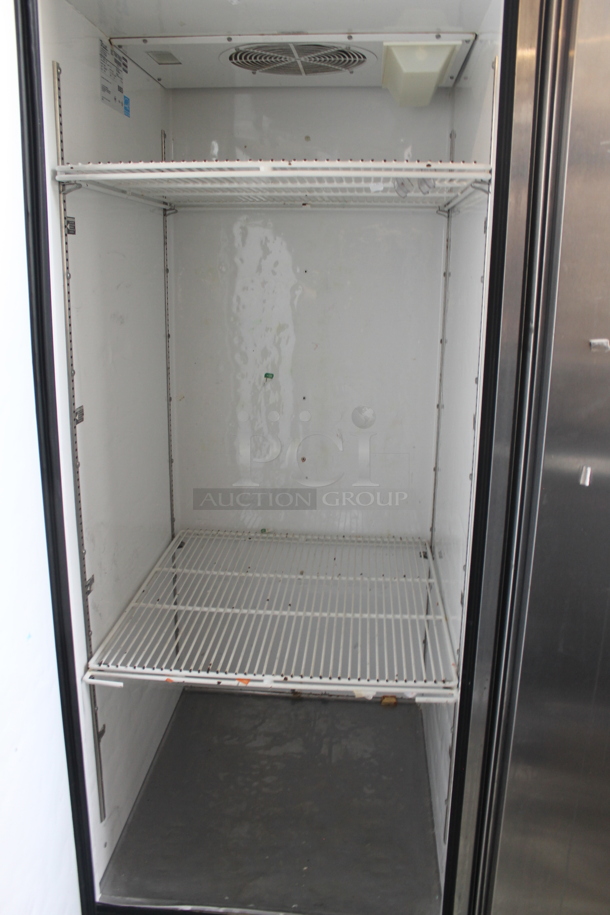 2013 True TG1R-1S ENERGY STAR Stainless Steel Commercial Single Door Reach In Cooler w/ Poly Coated Racks on Commercial Casters. 115 Volts, 1 Phase. Tested and Working! - Image 6 of 7