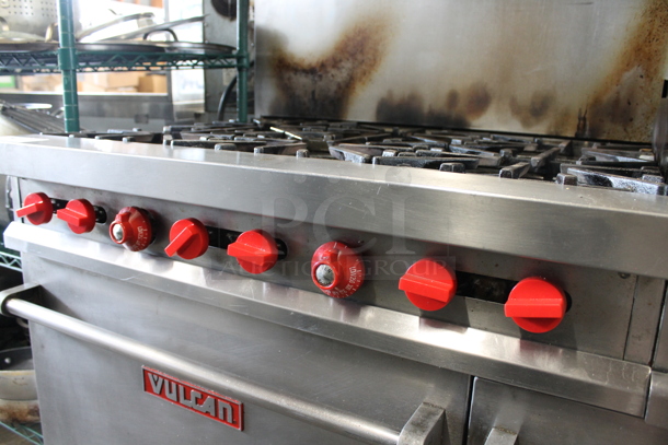 Vulcan Stainless Steel Commercial Natural Gas Powered 6 Burner Range w/ Flat Top, 2 Ovens, Over Shelf and Back Splash.  - Image 5 of 11