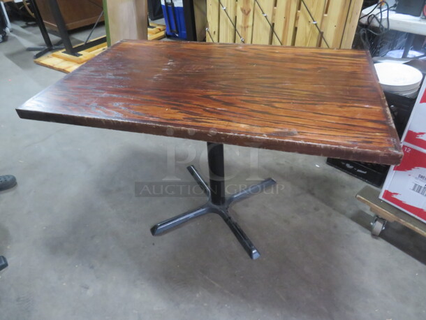 One Wooden Table Top On A Pedestal Base. 48X30X29