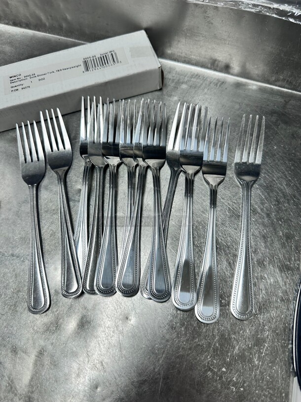 New! Winco 0005-05 7 3/8 inch Dinner Fork with 18/0 Stainless Grade, Dots Pattern NSF - Image 1 of 1