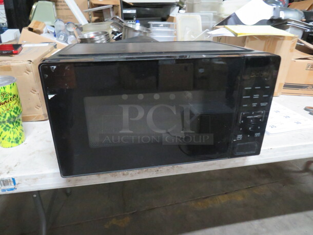 One Mainstays Microwave. 1500 Watt. 120 Volt. Model# MS5410012162. 20X15X11. - Image 1 of 1
