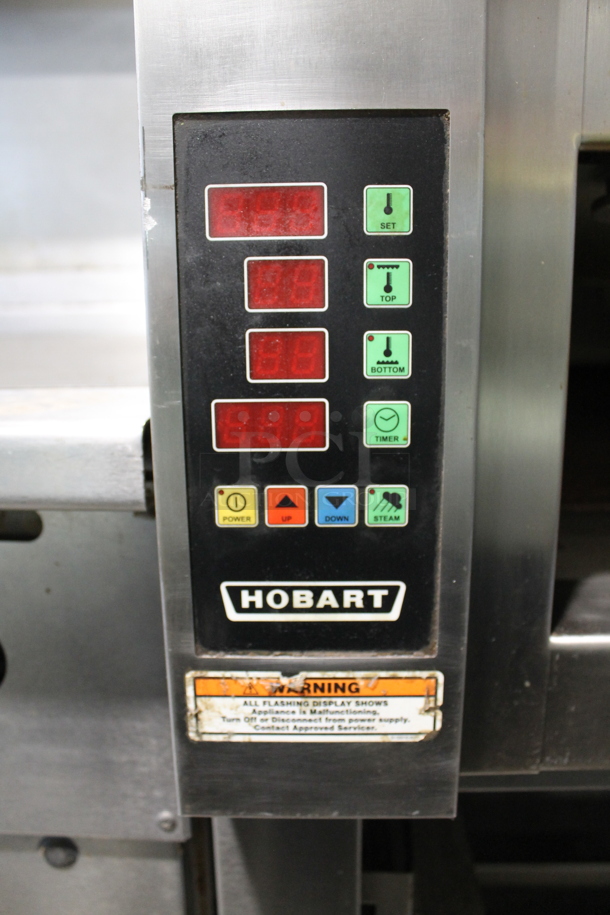 Hobart HWD03D Stainless Steel Commercial Electric Powered Triple Deck Bakery Oven on Pan Rack w/ Commercial Casters. 208 Volts, 3 Phase.  - Image 8 of 11