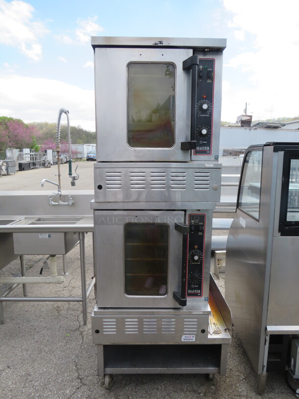 One Double Stack Garland Master 200 Natural Gas Half Size Convection Oven With 10 Racks, On A Stainless Steel Equipment Table With SS Under Shelf On Casters. 32X36X82