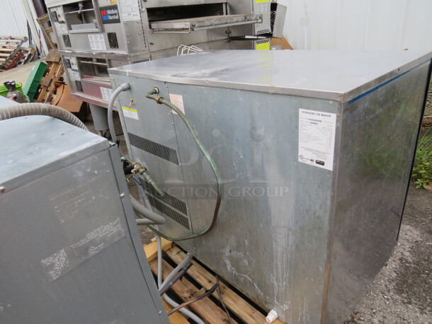 One Hoshizaki Ice Maker And Remote. Model# KM-2500SRH3.208-230 Volt. 3 Phase. 48X28X37. Remote 46.5X14.5X41.  - Image 3 of 4