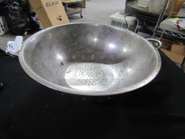 One 16 Inch Stainless Steel Colander.